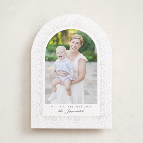 This is a snow gloss press holiday cards with gloss press by Kamala Nahas called frosted arch printing on recycled smooth signature in standard