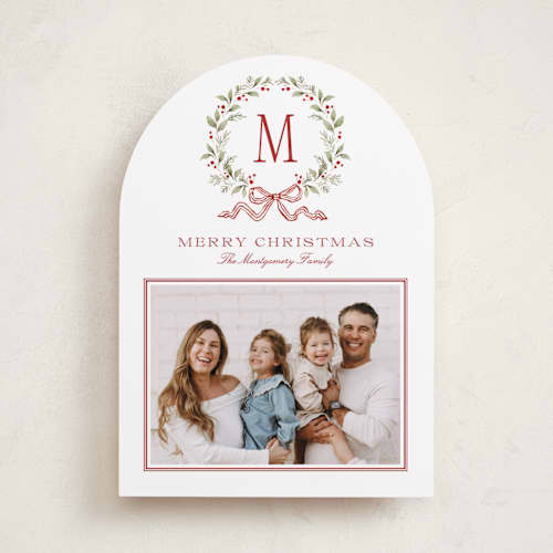 This is a cranberry holiday photo cards with standard by Wildfield Paper Co called holly berry monogram printing on recycled smooth signature in standard