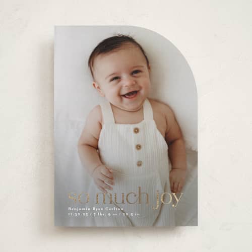 This is a snowfall babys first christmas with foil pressed by Mary Kay Garttmeier called baby joy printing on recycled smooth signature in standard