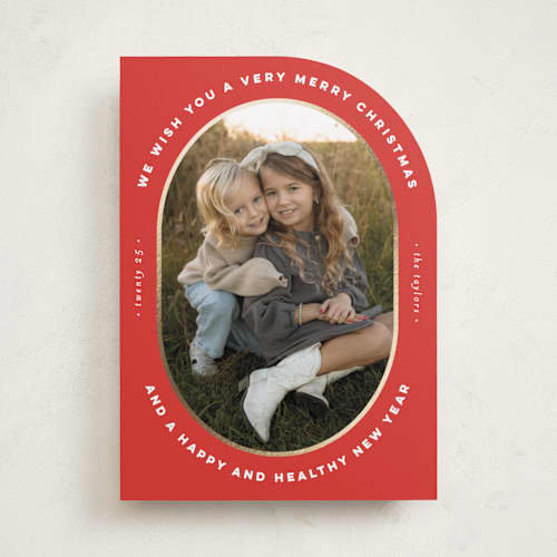 This is a poinsettia foil pressed holiday cards with foil pressed by Erica Krystek called oval frame printing on recycled smooth signature in standard