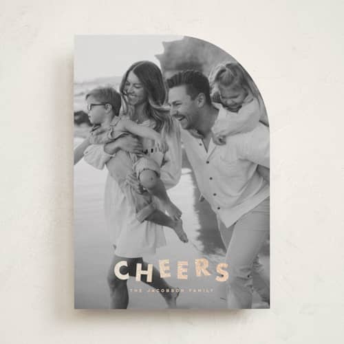 This is a champagne foil pressed holiday cards with foil pressed by Ellen Schlegelmilch called glitter cheers printing on recycled smooth signature in standard