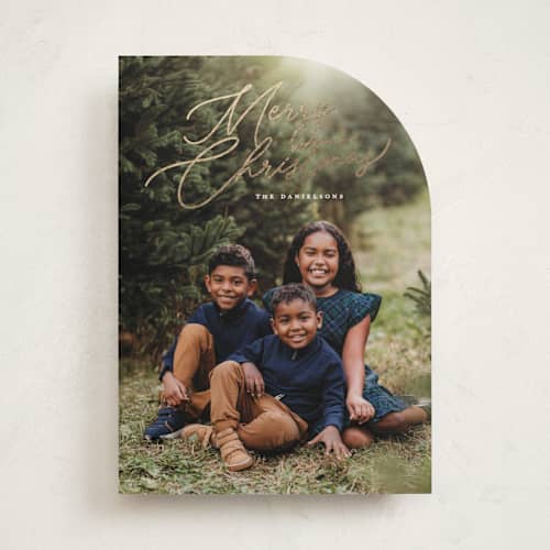 This is a snowfall foil pressed holiday cards with foil pressed by Melanie Kosuge called merry monoline printing on recycled smooth signature in standard