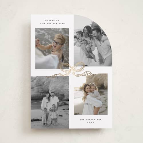 This is a vanilla foil pressed holiday cards with foil pressed by Creo Study called shimmering bow tie printing on recycled smooth signature in standard