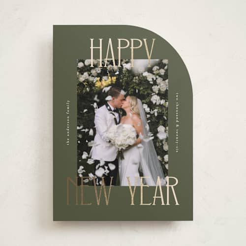 This is a juniper foil pressed holiday cards with foil pressed by Kelly Watkins called maeve printing on recycled smooth signature in standard