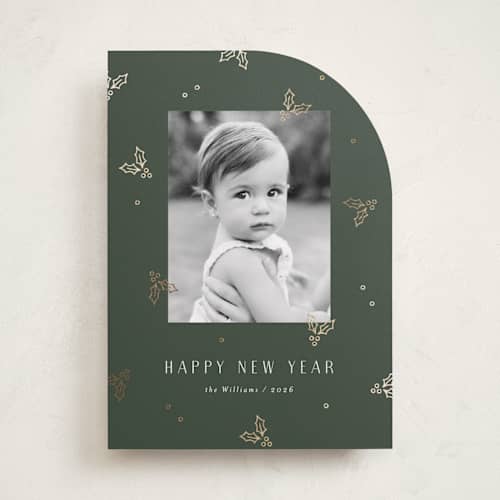 This is a evergreen foil pressed holiday cards with foil pressed by Michelle Taylor called jolly holly printing on recycled smooth signature in standard