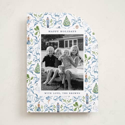 This is a blue ribbon holiday photo cards with standard by Sarah Knight called nutcracker ribbons printing on recycled smooth signature in standard