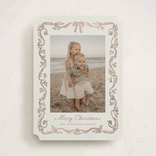 This is a rose foil pressed holiday cards with foil pressed by Chris Griffith called holiday falala printing on recycled smooth signature in standard