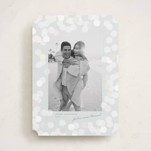 This is a frost gloss press holiday cards with gloss press by Claudia Orengo called lights printing on recycled smooth signature in standard