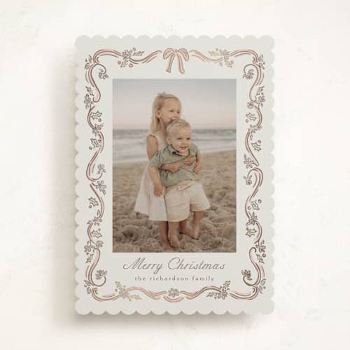 This is a rose foil pressed holiday cards with foil pressed by Chris Griffith called holiday falala printing on recycled smooth signature in standard