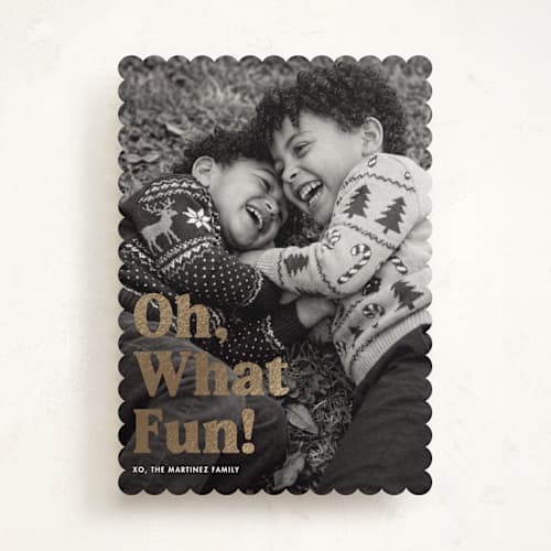 This is a cotton foil pressed holiday cards with foil pressed by Kerry Doyle called oh what fun printing on recycled smooth signature in standard