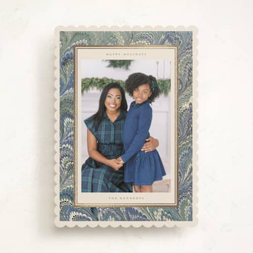 This is a blue spruce foil pressed holiday cards with foil pressed by Jenna Holcomb called marbled printing on recycled smooth signature in standard