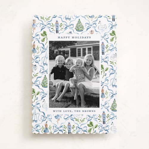 This is a blue ribbon holiday photo cards with standard by Sarah Knight called nutcracker ribbons printing on recycled smooth signature in standard