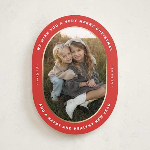 This is a poinsettia foil pressed holiday cards with foil pressed by Erica Krystek called oval frame printing on recycled smooth signature in standard