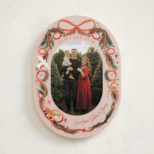 This is a scarlet foil pressed holiday cards with foil pressed by Elly called winter ribbon printing on recycled smooth signature in standard