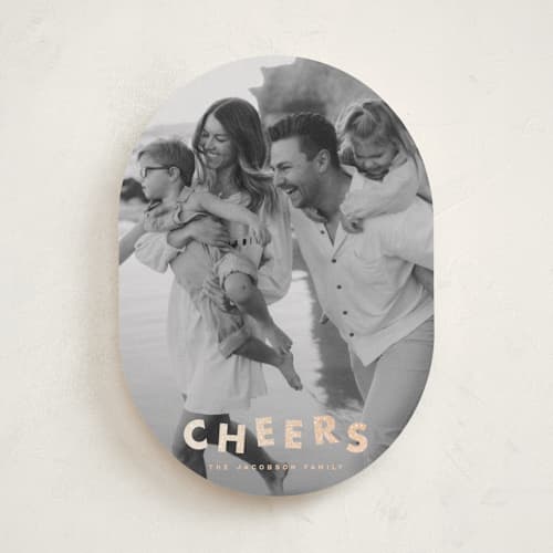 This is a champagne foil pressed holiday cards with foil pressed by Ellen Schlegelmilch called glitter cheers printing on recycled smooth signature in standard