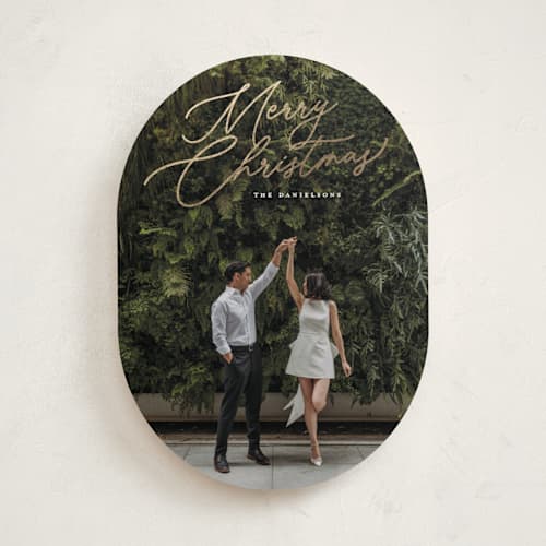 This is a snowfall foil pressed holiday cards with foil pressed by Melanie Kosuge called merry monoline printing on recycled smooth signature in standard