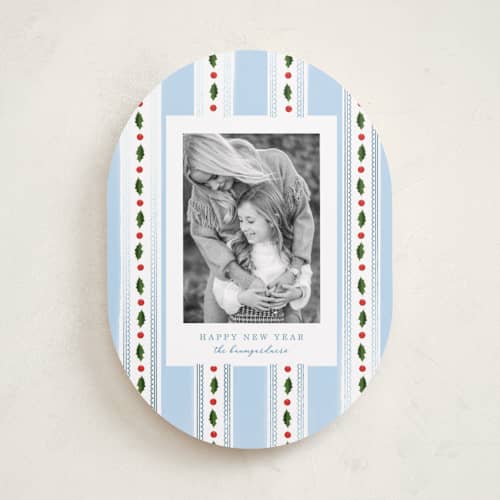 This is a robin's egg foil pressed holiday cards with foil pressed by Baumbirdy called holly frames printing on recycled smooth signature in standard