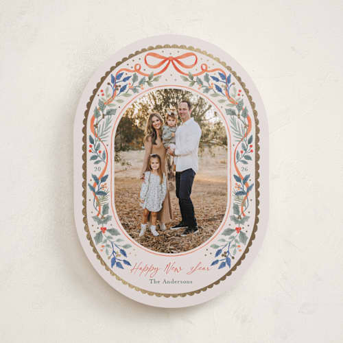 This is a holly foil pressed holiday cards with foil pressed by Elly called a gentle bow printing on recycled smooth signature in standard