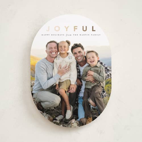 This is a coal foil pressed holiday cards with foil pressed by Laura Hamm called a joyful family printing on recycled smooth signature in standard