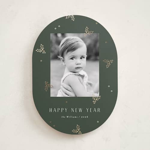 This is a evergreen foil pressed holiday cards with foil pressed by Michelle Taylor called jolly holly printing on recycled smooth signature in standard