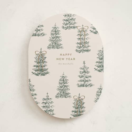 This is a champagne non photo holiday cards with standard by Angela Garrick called festive forest printing on signature in standard