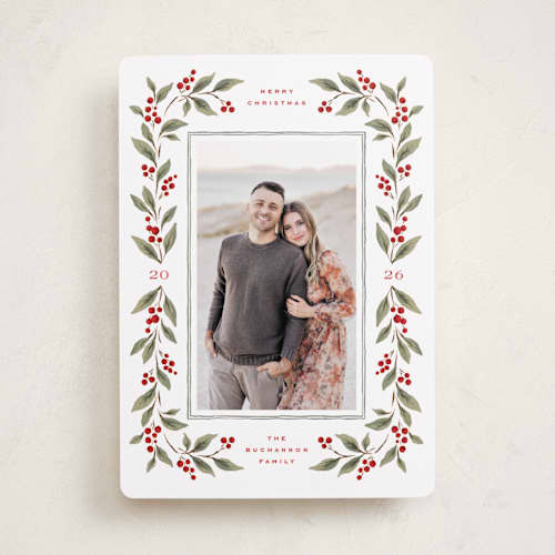 This is a mistletoe photo christmas cards with standard by Wildfield Paper Co called poinsettia + pine printing on recycled smooth signature in standard
