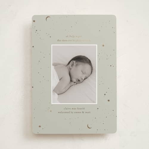 This is a sage babys first christmas with foil pressed by Ellen Schlegelmilch called the stars printing on recycled smooth signature in standard