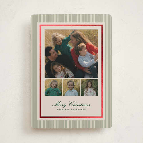 This is a pistachio foil pressed holiday cards with foil pressed by Amy Kross called nicholas printing on recycled smooth signature in standard