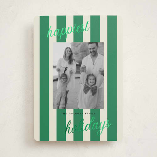 This is a pine foil pressed holiday cards with foil pressed by Louise Kay called happiest holidays printing on recycled smooth signature in standard