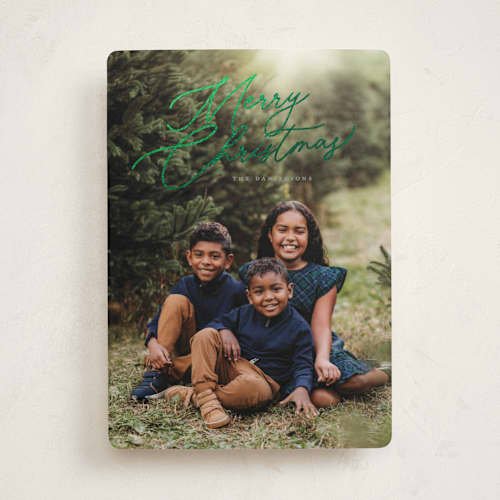 This is a sage foil pressed holiday cards with foil pressed by Melanie Kosuge called merry monoline printing on recycled smooth signature in standard