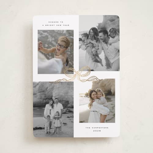 This is a vanilla foil pressed holiday cards with foil pressed by Creo Study called shimmering bow tie printing on recycled smooth signature in standard