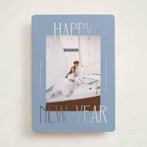 This is a waterfall foil pressed holiday cards with foil pressed by Kelly Watkins called maeve printing on recycled smooth signature in standard