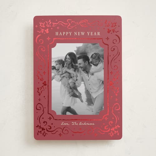 This is a crimson foil pressed holiday cards with foil pressed by Cass Loh called holly whirl printing on recycled smooth signature in standard