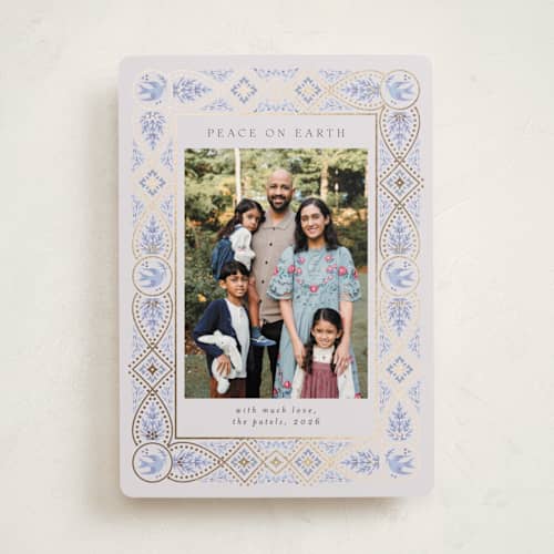 This is a blue spruce foil pressed holiday cards with foil pressed by Ana de Sousa called symbols of faith printing on recycled smooth signature in standard