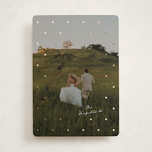 This is a snowflake foil pressed holiday cards with foil pressed by Morgan Kendall called speckled printing on recycled smooth signature in standard