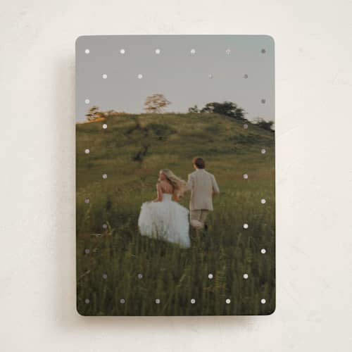 This is a coal foil pressed holiday cards with foil pressed by Morgan Kendall called speckled printing on recycled smooth signature in standard