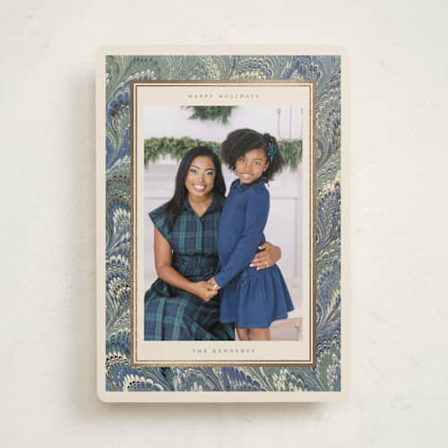 This is a blue spruce foil pressed holiday cards with foil pressed by Jenna Holcomb called marbled printing on recycled smooth signature in standard