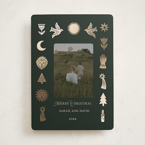 This is a evergreen foil pressed holiday cards with foil pressed by Rina Ozum called folk icons printing on recycled smooth signature in standard
