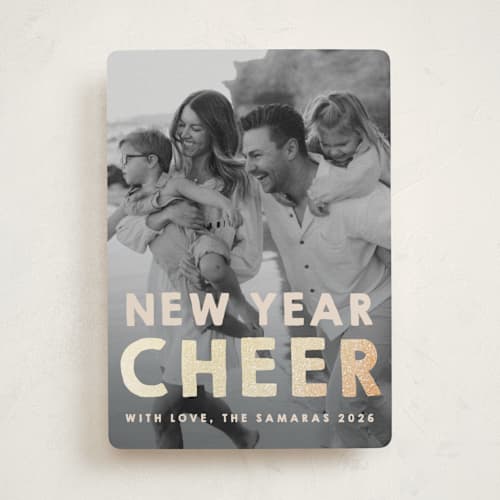 This is a cream foil pressed holiday cards with foil pressed by Snow and Ivy called nyc printing on recycled smooth signature in standard