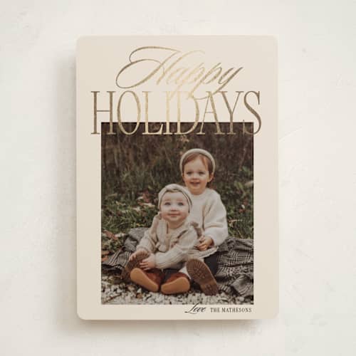 This is a tinsel foil pressed holiday cards with foil pressed by Kelly Schmidt called happy script printing on recycled smooth signature in standard