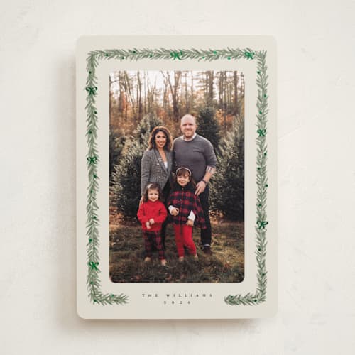 This is a eggnog foil pressed holiday cards with foil pressed by Adelyn T. called pine and bow printing on recycled smooth signature in standard