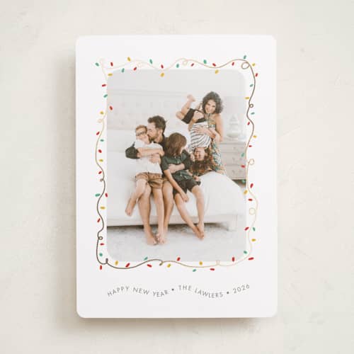 This is a frosting foil pressed holiday cards with foil pressed by Holly Whitcomb called crazy lights printing on recycled smooth signature in standard