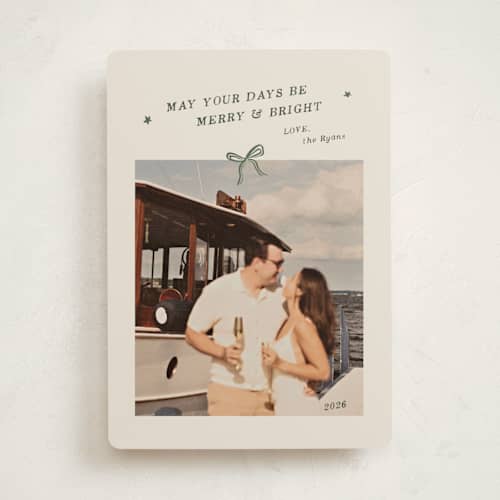 This is a glade holiday photo cards with standard by Ani Somi called merry little bow printing on recycled smooth signature in standard