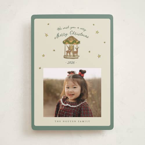 This is a pine holiday photo cards with standard by Bailamor Design by CM called carousel printing on recycled smooth signature in standard