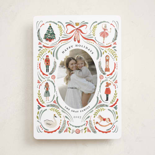 This is a holly leaf holiday photo cards with standard by Sarah Knight called nutcracker dance printing on recycled smooth signature in standard