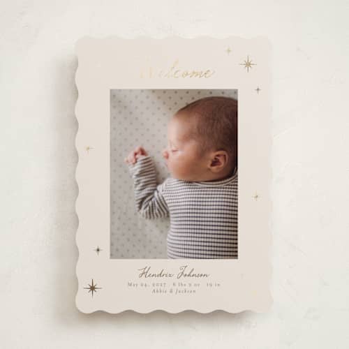 This is a linen foil stamped birth announcements with foil pressed by Nicole Walsh called scattered stars printing on recycled smooth signature in standard
