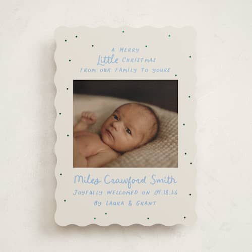 This is a powder babys first christmas with foil pressed by Megan Davis called little merry printing on recycled smooth signature in standard