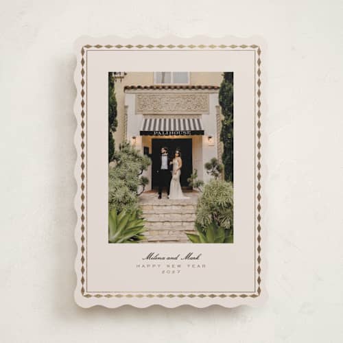 This is a eggnog foil pressed holiday cards with foil pressed by Tamara Hilje called diamond border printing on recycled smooth signature in standard