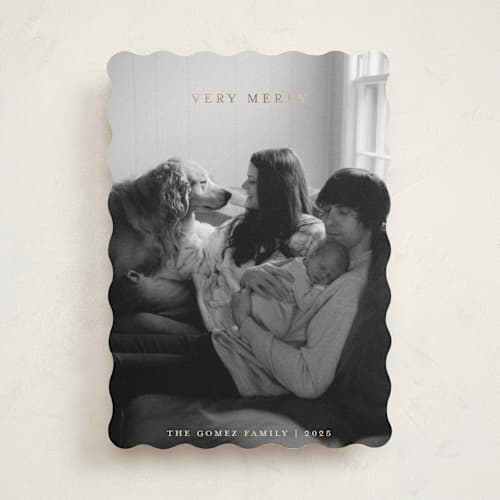 This is a buttercream foil pressed holiday cards with foil pressed by Carolyn Hunt called golden merry printing on recycled smooth signature in standard