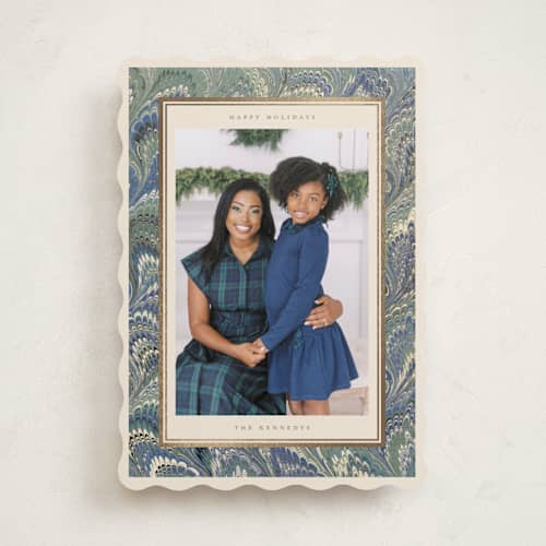 This is a blue spruce foil pressed holiday cards with foil pressed by Jenna Holcomb called marbled printing on recycled smooth signature in standard